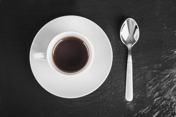 cup of coffee and teaspoon