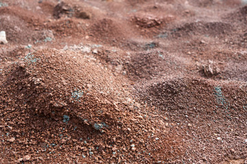 Red earth or soil background. Tropical laterite soil  background of red clay. Dry Orange surface, Picture of natural disaster. Drought land Caused by global warming and deforestation.