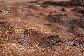 Red earth or soil background. Tropical laterite soil  background of red clay. Dry Orange surface, Picture of natural disaster. Drought land Caused by global warming and deforestation.