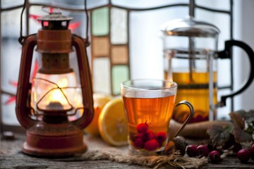 Hawthorn and ripe hawthorn fruit, tea with hawthorn and lemon