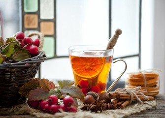 Hawthorn and ripe hawthorn fruit, tea with hawthorn and lemon