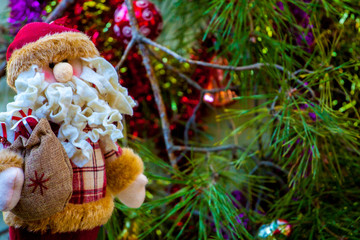Santa Claus, decorations and Christmas tree.