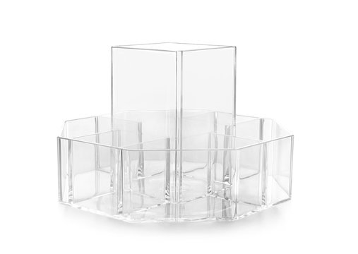 Empty transparent organizer for makeup cosmetic products on white background