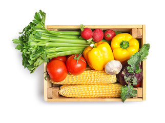 Box with fresh vegetables on white background, top view