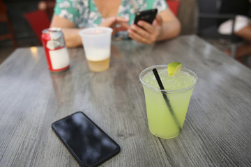 Friends at the bar. Happy hour time.