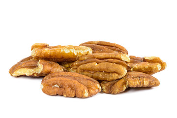 Heap of pecan nuts on white background