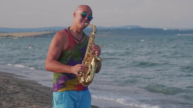 Bald Saxophone Player, Black glasses and sea