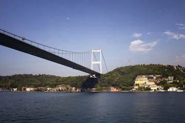 Obraz premium View of FSM bridge, Bosphorus and buildings on Aisan side of Istanbul. It is a sunny summer day.