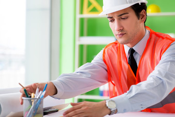 Man architect working on the project