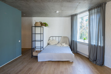 Bed in the apartment. Bedroom in studio apartment. © Aleks Kend