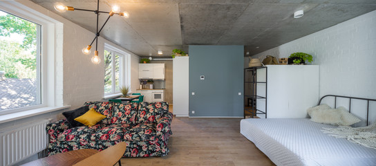 Bed in the apartment. Bedroom in studio apartment. © Aleks Kend