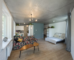 Bed in the apartment. Bedroom in studio apartment. © Aleks Kend