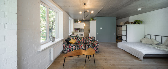 Bed in the apartment. Bedroom in studio apartment. © Aleks Kend