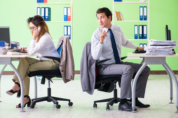 Two colleagues working in the office