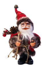 Cute isolated Santa Claus toy with bag of presents. Santa doll photo.