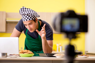 Young chef blogger explaining food preparation  