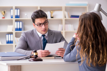 Lawyer discussing legal case with client