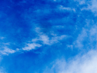 Fototapeta na wymiar Blue sky with wispy clouds