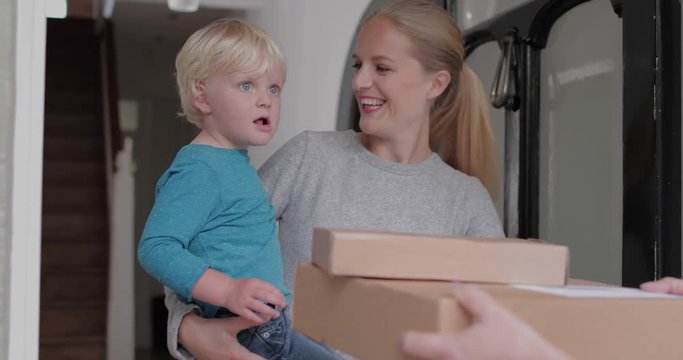 Young family receiving a home delivery