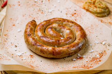fried snail sausages on the Board
