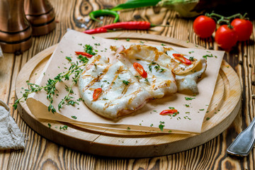 Roasted squid on board