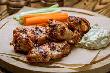 Chicken wings with blue cheese sauce