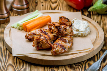 Chicken wings with blue cheese sauce