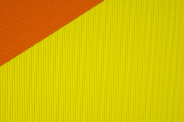 Yellow and orange corrugated paper texture, use for background. vivid colour with empty space for add text or object.