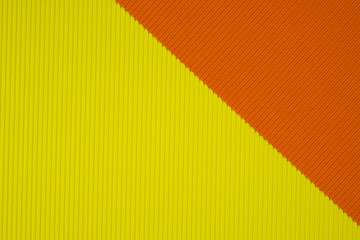 Yellow and orange corrugated paper texture, use for background. vivid colour with empty space for add text or object.