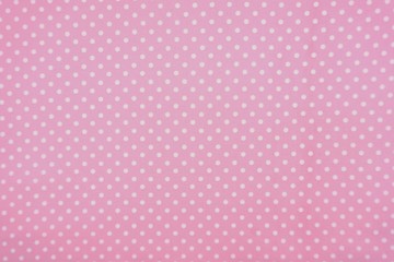 seamless pattern pink fabric and purple polka dots background 