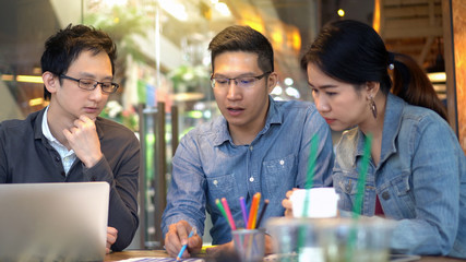 Asian Business people with casual suit working and brainstorming together in the modern Office or workplace, people group shot concept