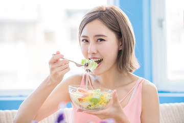 beauty woman eat salad