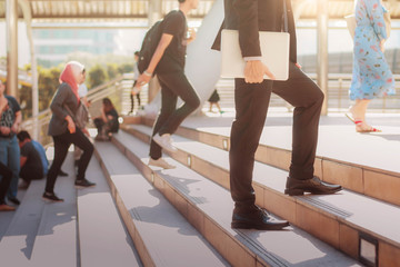 Businessman is walking to work.