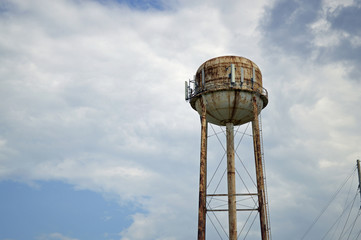 photo of an old rusty water tower