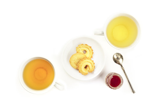 An overhead photo of tea on a white background with copy space