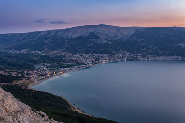 Obraz premium Village Baska at sunrise with sea and hills, island Krk, Croatia