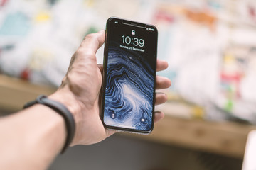 Hand holding mobile phone