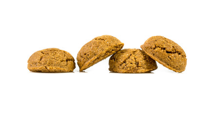 Pepernoten bunch of traditional cookies in a row on white background