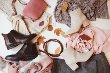 Foto op Plexiglas set of seasonal autumn fashion woman clothes, top view with copy space. Trendy shoes, sweater and handbag. © mashiki