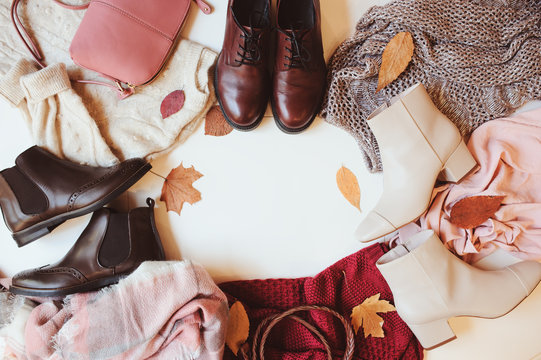 set of seasonal autumn fashion woman clothes, top view with copy space. Trendy shoes, sweater and handbag.