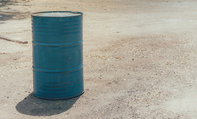 Fototapeta premium the blue steel tank on the ground for keep water or oil. with copy space for text.