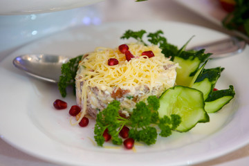 Salad from different kinds of vegetables and meat