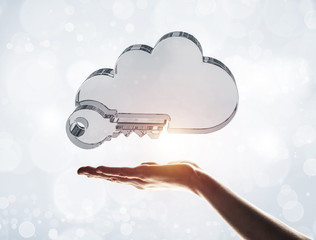 Cloud computing concept with glass symbol shown in hand