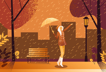 Girl with umbrella walks in the rain in park.