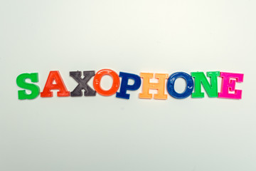 The word Saxophone concept and theme written in plasric colorful letters