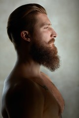 Fototapeta na wymiar Side view portrait of a bearded man