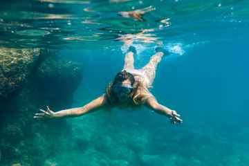 Obraz na płótnie Canvas Snorkeling underwater in the tropical sea