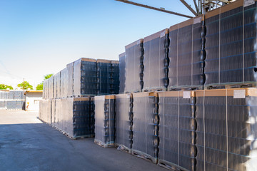 Many wine bottles packed for wholesale at winery