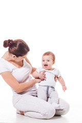 Close up view of attractive young mother with her baby