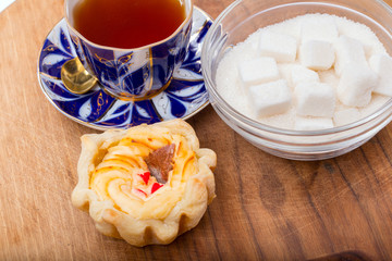 Homemade cream cake on table